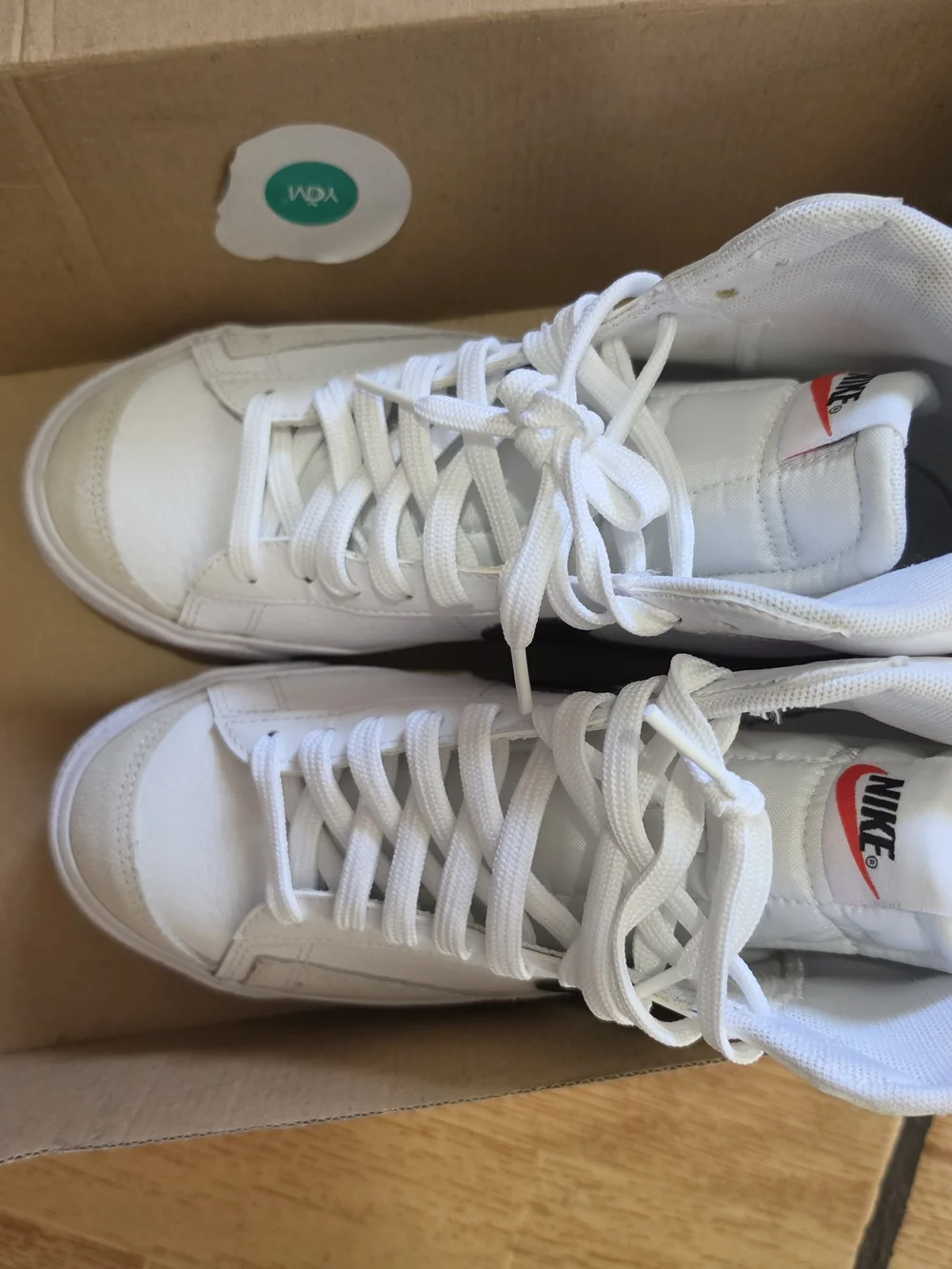 Nike Blazer White High-Top Sneakers with Black Swoosh